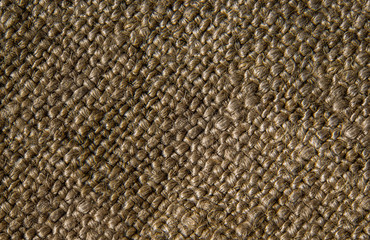 Texture of rough brown fabric. Vintage, rustic motifs. Background texture, closeup.