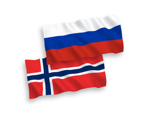 National vector fabric wave flags of Norway and Russia isolated on white background. 1 to 2 proportion.