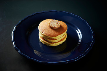 Pancake with nuts paste on plate