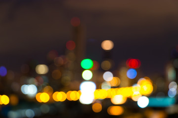 Fototapeta premium Bokeh blur at night light background, Blur landscape, Blur Spot lighting, city backdrop.