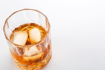 Whiskey with ice cubes.