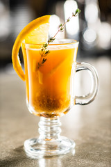 winter cocktail with thyme and orange