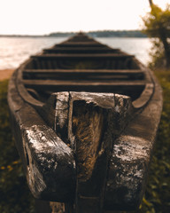 Abandoned boat on the river bank