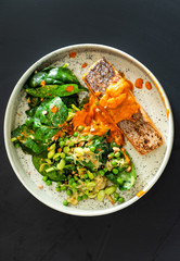 salmon steak with salad