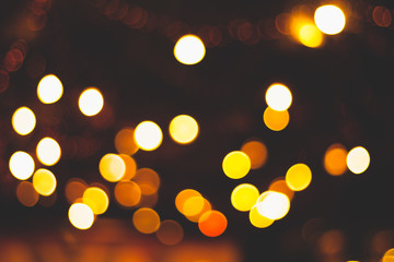 Bokeh lights line background from a night wedding.Blurred of hall wedding.