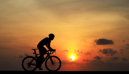 Fototapeta premium Cycling Silhouette on sunrise background