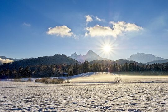 Panoramic view of beautiful winter landscape in the Bavarian Alps with Watzmann in the background, National Park Berchtesgadener Land, Bavaria, Germany