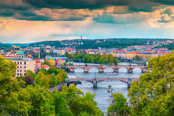 Obraz premium Picturesque cityscape panorama with bridges and river, Prague, Czech Republic