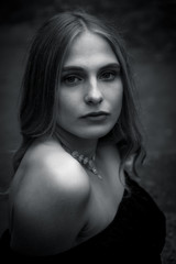 Portrait of pretty blond woman wearing black