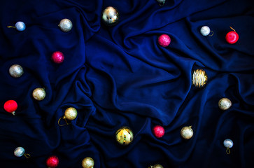 Blue velvet background with Christmas decoration balls