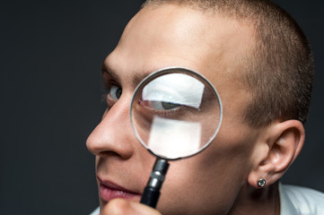 Portrait of a curious young handsome guy