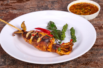 Grilled squid with sauce and hebs