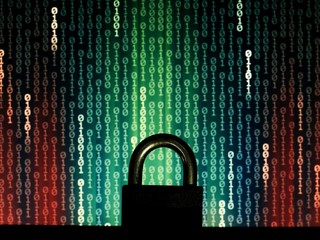 closed padlock in front of matrix style computer language binary data code. blue green binary...