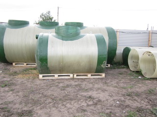 Large plastic barrels for water