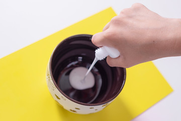 a girl making slime herself