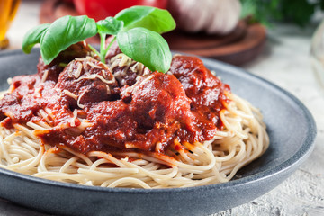 Spaghetti pasta with meatballs and tomato sauce