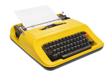 Yellow typewriter isolated on white background