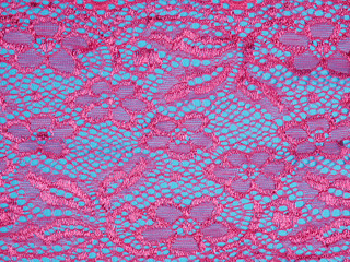 Red laces on a blue background macro