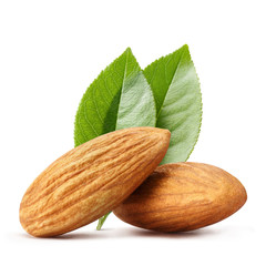 Close-up of two almonds with leaves, isolated on white background