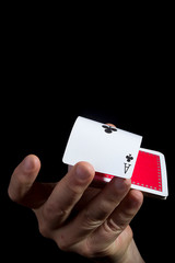 Hand with playing cards