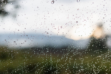 Raindrops on window glasses surface , Natural Pattern of raindrops.
