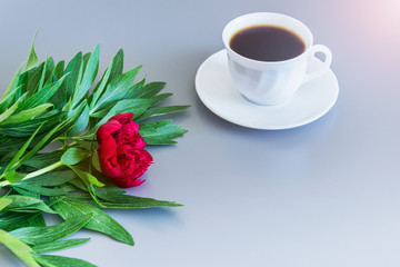 Peony flower with cup of coffee