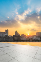 Shanghai bund skyline and empty square floor at sunset