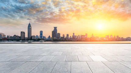 Shanghai bund skyline and empty square floor at sunset