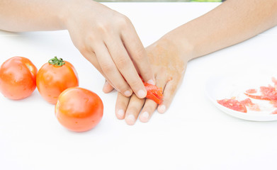 .Fresh red tomatoes and skin mask. Natural beauty