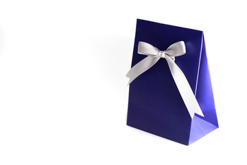  Gift box with white  bow  on whote isolated  background for greeting card. Fathers Day  celebration.