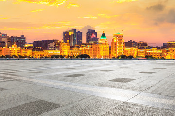 Shanghai bund skyline and empty square floor at sunset