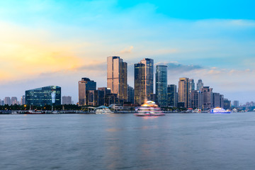Fototapeta na wymiar Shanghai city skyline and modern commercial office building at dusk