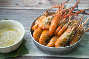 Grilled shrimp served with seafood sauces