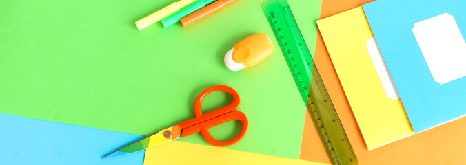 Banner back to school background. School supplies bright colors at abstract colored background. Education concept. Top view. Copy space