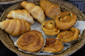 Close up bread and pastry in the bamboo basket