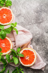 Sliced ​​grapefruit on a concrete surface to make a refreshing sangria drink