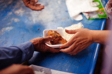 The Concept of Hunger Hunger : Sharing food with people in poor communities : The concept of feeding
