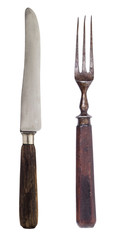 Beautiful old vintage fork and knife isolated on white background. Top view. Retro silverware