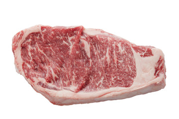 Uncooked beef Striploin Steak isolated on white background.