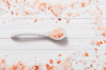 himalayan salt on white wooden background