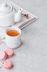 Relaxing tea, macaroons and book