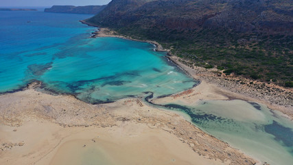 Obraz premium Aerial drone bird's eye view photo of tropical caribbean paradise bay and lagoon with white sandy beach and turquoise clear sea