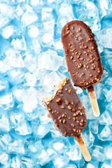 Cream brulee ice cream popsicles .