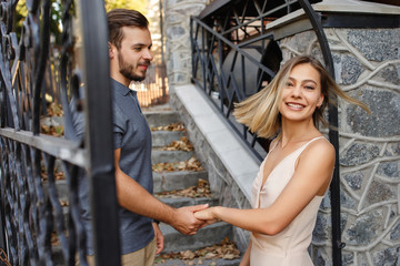 Happy couple in love walking in the city