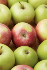 A group of fresh red and green apples. Close-up