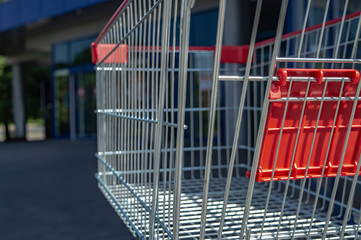 trolley from supermarket on the street on a sunny day closeup