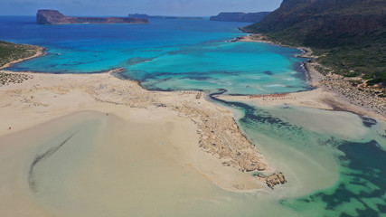Obraz premium Aerial drone bird's eye view photo of tropical caribbean paradise bay and lagoon with white sandy beach and turquoise clear sea