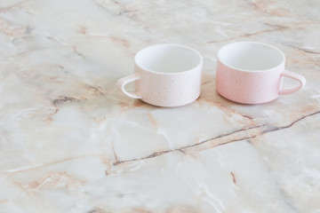 clean cups on marble table