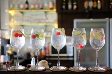 summer drinks of gin tonic alcoholic cocktails on table