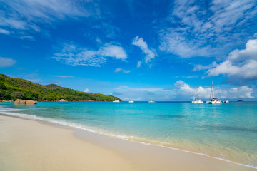 Fototapeta na wymiar Beautiful sandy beach with turquoise sea on Seychelles.